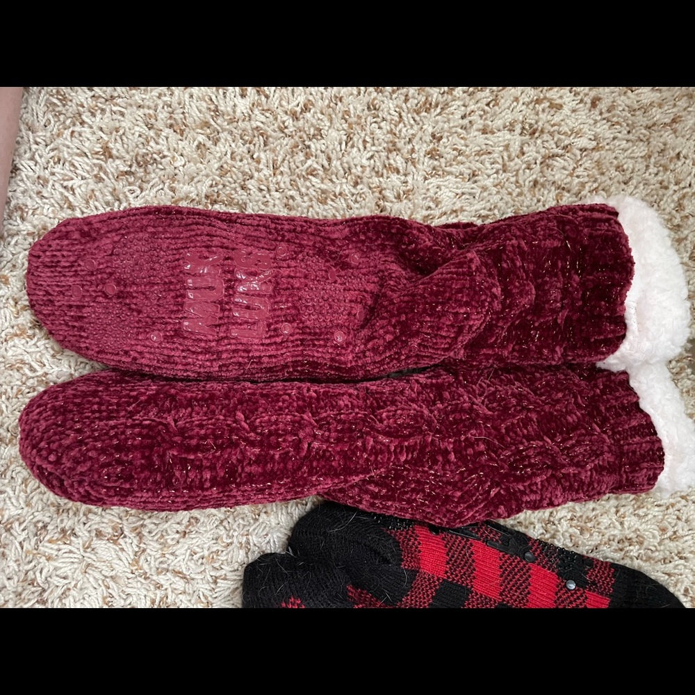 2 brand new pairs of muk luk socks, one pair with no tags worn once